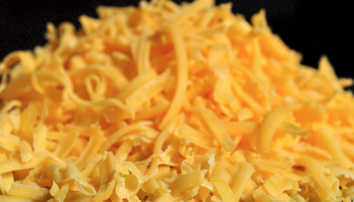 Record-High Cheese Stocks Weigh on Milk Prices, But Should They?